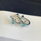 Saturn aqua blue diamond earrings  02456