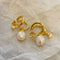 Specific natural shaped pearl earrings 02566