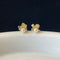 Small Saturn stud earrings 02251