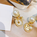 Size pearl shell earrings 02702