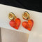 Critical strike girl heart red heart ear clip 02701