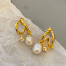 Specific natural shaped pearl earrings 02566