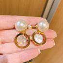 Size pearl shell earrings 02702